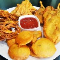 Mixed Platter · Crisp fried Mixed Veg. Juliennes in a batter of chickpea flour, spices and herbs served with...