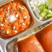 Bombay Special Pav Bhaji · Pav Bhaji is made with potatoes and vegetables cooked in a tomato base, and enjoyed with pav...