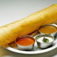 Plain Dosa · Plain dosa served with sambar and coconut chutney.