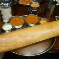 Paper Dosa · A paper thin big dosa served with sambar and coconut chutney.