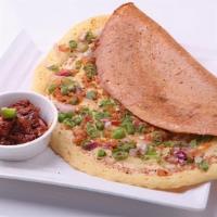 Occ Masala Dosa · Plain dosa with onions, green chillies, cheese and potatoes served with sambar and coconut c...