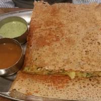 Chennai Rava Masala Dosa · Rava Dosa with spread potatoes & various other aromatic spices served with sambar and coconu...