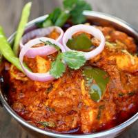 Kadai Paneer · Fresh cheese, onions and bell peppers sautéed with spices and herbs.