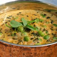 Mutter Methi Malai · Fenugreek leaves and green peas prepared in a rich cashew nut sauce.