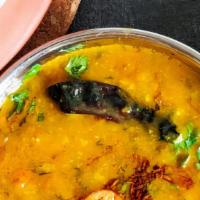Yellow Dal Tadka · Yellow Dal Tadka is a simple Indian lentils curry tempered with spices and herbs.
