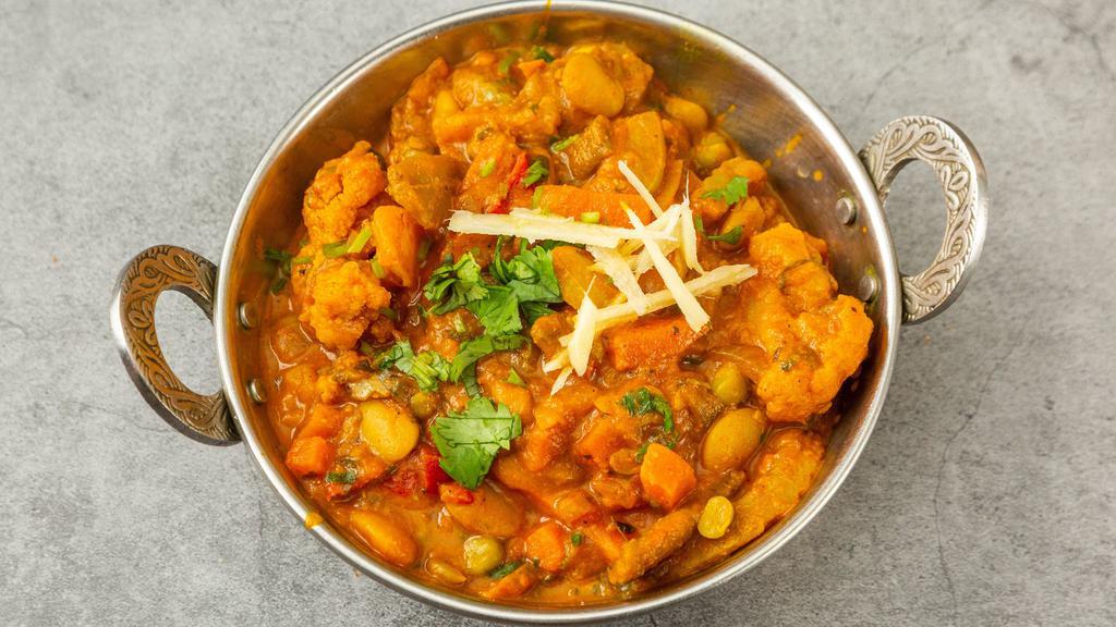 Mix Vegetable Curry · A variety of vegetables cooked with herbs and spices in curry sauce.