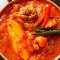 Vegetable Vindaloo · Vindaloo is a very hot and spicy dish cooked with some pieces of potatoes, chili powder and ...