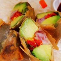 Avocado Rolls · Avocado, dried tomatoes, shallot, onion and cilantro wrapped in thin rice paper. Served with...