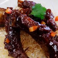 Papa Spare Ribs · Slow cooked spare ribs that are cooked in hoisin sauce 

(4pcs).