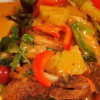Duck Pineapple Curry · Spicy. Roasted boneless duck in red curry with pineapples, bell peppers, basil, onion, and t...