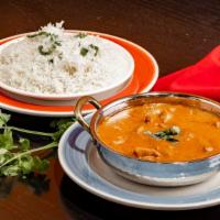 Chicken Kurma · Boneless chicken cooked with tangy sauce and spices.