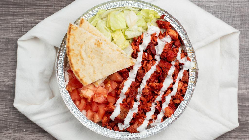 Chicken Over Rice Platter · Served with chicken, rice, lettuce, and tomatoes along with your favorite toppings and white and hot sauce on the side.
