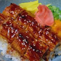 Unagi (Eel) Rice Box · Broiled Eel with Eel Sauce, Sesame Seeds, Pickled Radish, Pickled Ginger, and Green Onion ov...