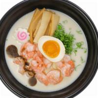 Tonkotsu Ramen · Pork bone broth base. Spicy. Pork Cream Base

Comes with Bamboo, Fish Cake, Green Onion, and...