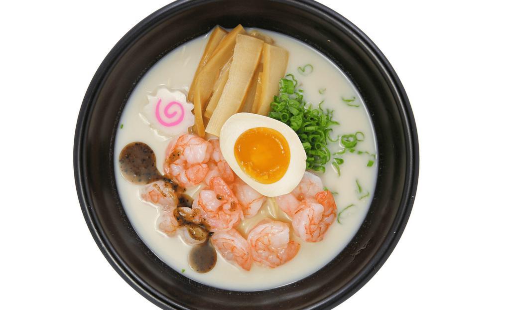 Tonkotsu Ramen · Pork bone broth base. Spicy. Pork Cream Base

Comes with Bamboo, Fish Cake, Green Onion, and Half a Soft Boiled Marinated Egg.