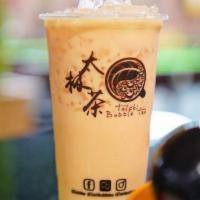 Thai Tea Milk Tea · Cold only. Comes with pearls. Has real cream
