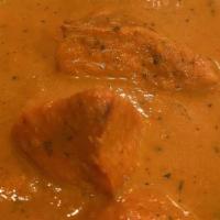Chicken Tikka Masala · Grilled chicken simmered in a creamy tomato sauce. Served with rice.
