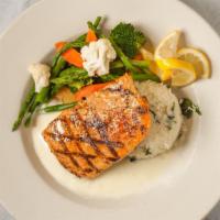 Grilled Salmon · Sauce: white wine creme reduction.