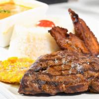 Carne Asada Y Arroz Con Menestra / Grilled Steak · Jugosa carne a la parrilla acompañada de arroz blanco, menestra, patacones y plátano maduro ...