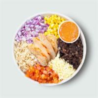 Smokehouse Bowl · Brown rice, aged cheddar, black beans, red onions, tomatoes, corn, spicy yogurt sauce. 480 c...