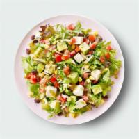 Fiesta Salad · Field greens, avocado, aged cheddar, corn, black beans, salsa fresca, crispy wontons, cilant...