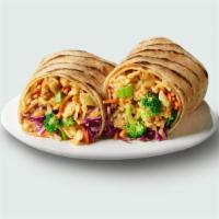 Buddha'S Satay Burrito · Brown rice, broccoli, carrots, cabbage, crispy wontons, green onions, spicy peanut sauce. 74...