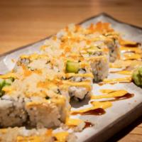 Shrimp Crunch Roll · Shrimp, cucumber, masago, eel sauce, spicy mayo, & tempura flakes with sesame seeds