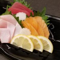 Sashimi Platter · 3pcs tuna (From Indian Ocean), 3pcs salmon (From Norway), 3pcs yellowtail (From Pacific Ocean)