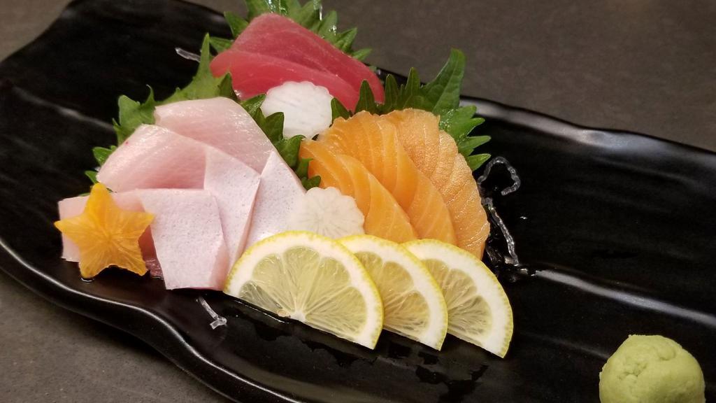 Sashimi Platter · 3pcs tuna (From Indian Ocean), 3pcs salmon (From Norway), 3pcs yellowtail (From Pacific Ocean)
