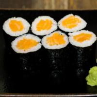 Salmon Roll · Raw sushi salmon wrapped with rice and nori