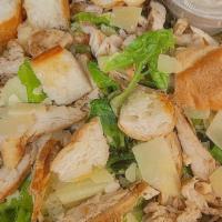 Caesar Salad · Chopped Romaine hearts, Shaved Parmesan, freshly toasted Croutons, topped with our Homemade ...
