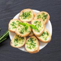 Cheese Garlic Bread Blast · House-made signature garlic bread, served with Romano lightly dipped in olive oil and cheese.