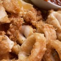 Calamari · Fried calamari and marinara sauce.