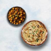 Channa Masala & Garlic Naan · Chickpeas cooked with farm-fresh vegetables and special herbs. Served with Indian flatbread ...