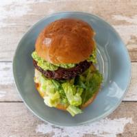 Veggie Burger · Black bean based patty with BBQ sauce, avocado smash and a side of root veggie chips. Contai...