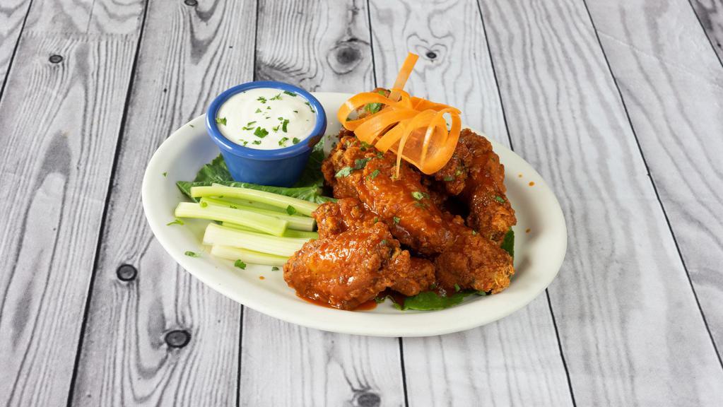 Wings · Jumbo wings tossed in buffalo or barbecue sauce.