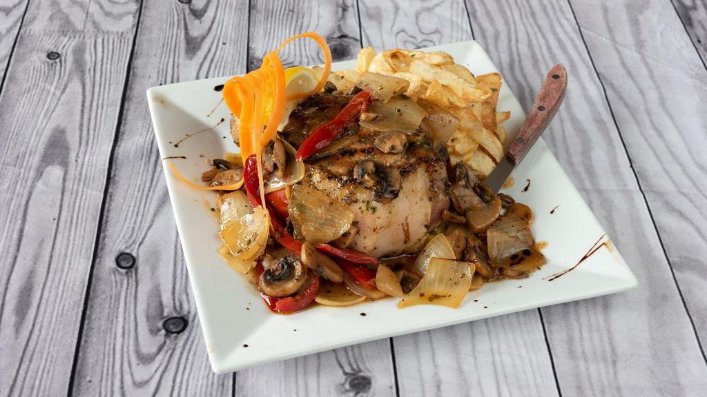 Double Cut Pork Chop Giambotta · Double-cut pork chop sautéed with mushrooms, peppers and onions and topped with homemade garlic-seasoned Italian fries.