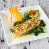 Baked Salmon Stuffed With Crabmeat · Baked salmon stuffed with crabmeat in a lemon white wine sauce, served with mixed vegetables...
