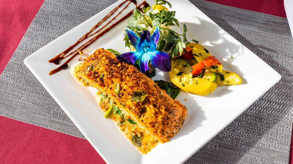 Salmon Oreganata · Salmon lightly breaded over spinach topped lemon in a white wine sauce, served with mixed vegetables and garlic mashed potatoes.