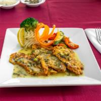Chicken Francese · Chicken breast dipped in batter and sautéed in a lemon and white wine sauce.