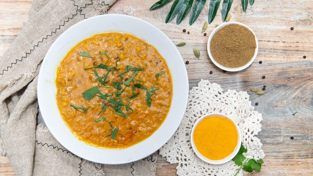 Yellow Tarka Dall · Vegetarian. Yellow lentils cooked with spice, onion and tomato.
