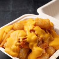 Kimcheese Tots · Tater tots smothered with kimchi and melted cheese. add spicy bacon