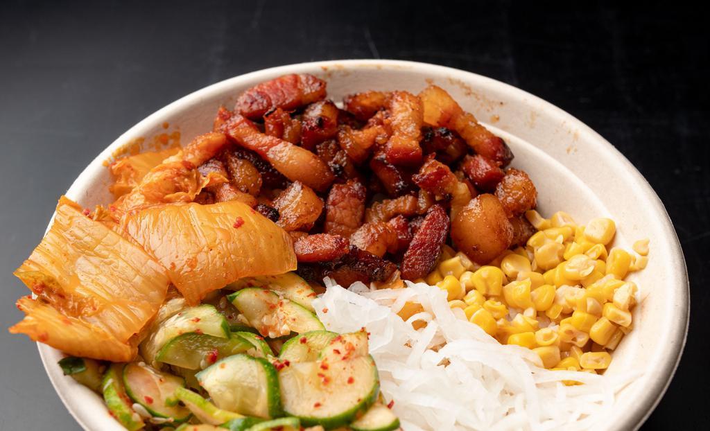 Combo 3 - Um, Because Bacon? · Spicy bacon, white rice, corn, radish, butter kimchi, cucumber kimchi, green sauce.