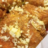 Garlic Wings · Deep fried wings in garlic sauce