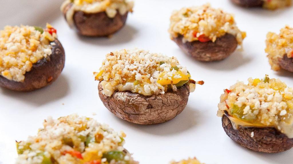 Stuffed Mushrooms · (6) Baked mushroom cap stuffed with a vegetables – bread crumbs mixture, melted mozzarella on top.