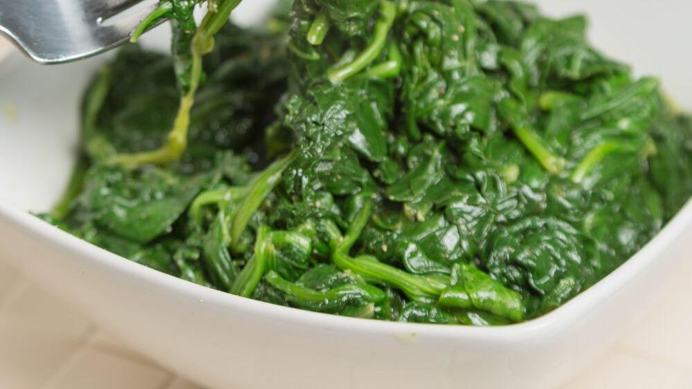 Baby Spinach · Baby spinach in garlic and olive oil.