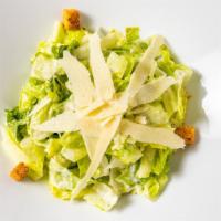 Caesar Salad · Hearts of romaine, aged parmigiana, toasted croutons, housemade caesar dressing.