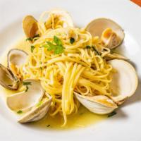 Linguini Vongole · Served with baby clams, parsley, garlic white wine sauce.