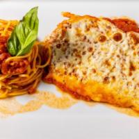 Parmigiana · Breaded with melted mozzarella and marinara sauce.