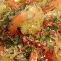 Gamberi Oreganata · Shrimp topped with seasoned bread crumbs, in butter-garlic-oregano sauce.
